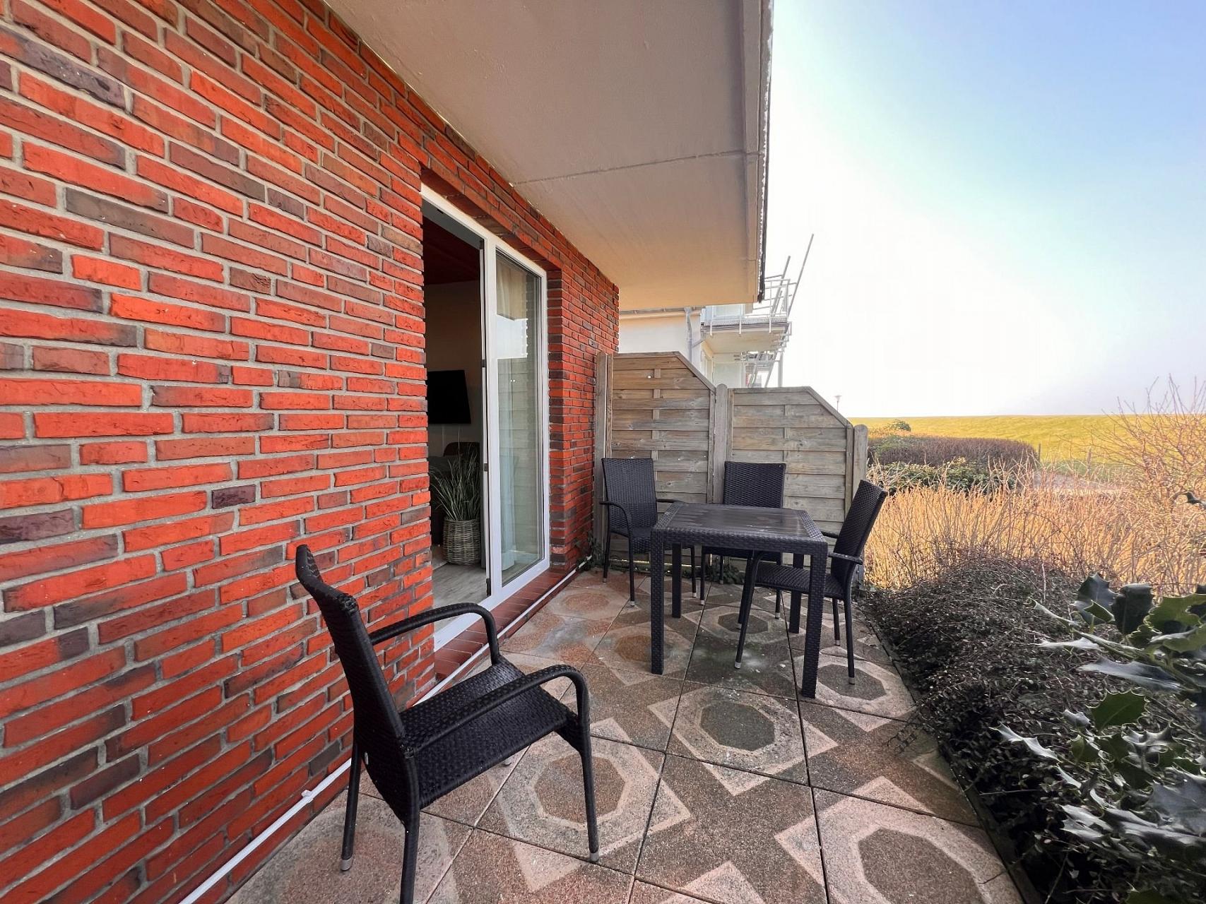 Ferienwohnung NW 26 Terrasse mit Meerblick Foto 2