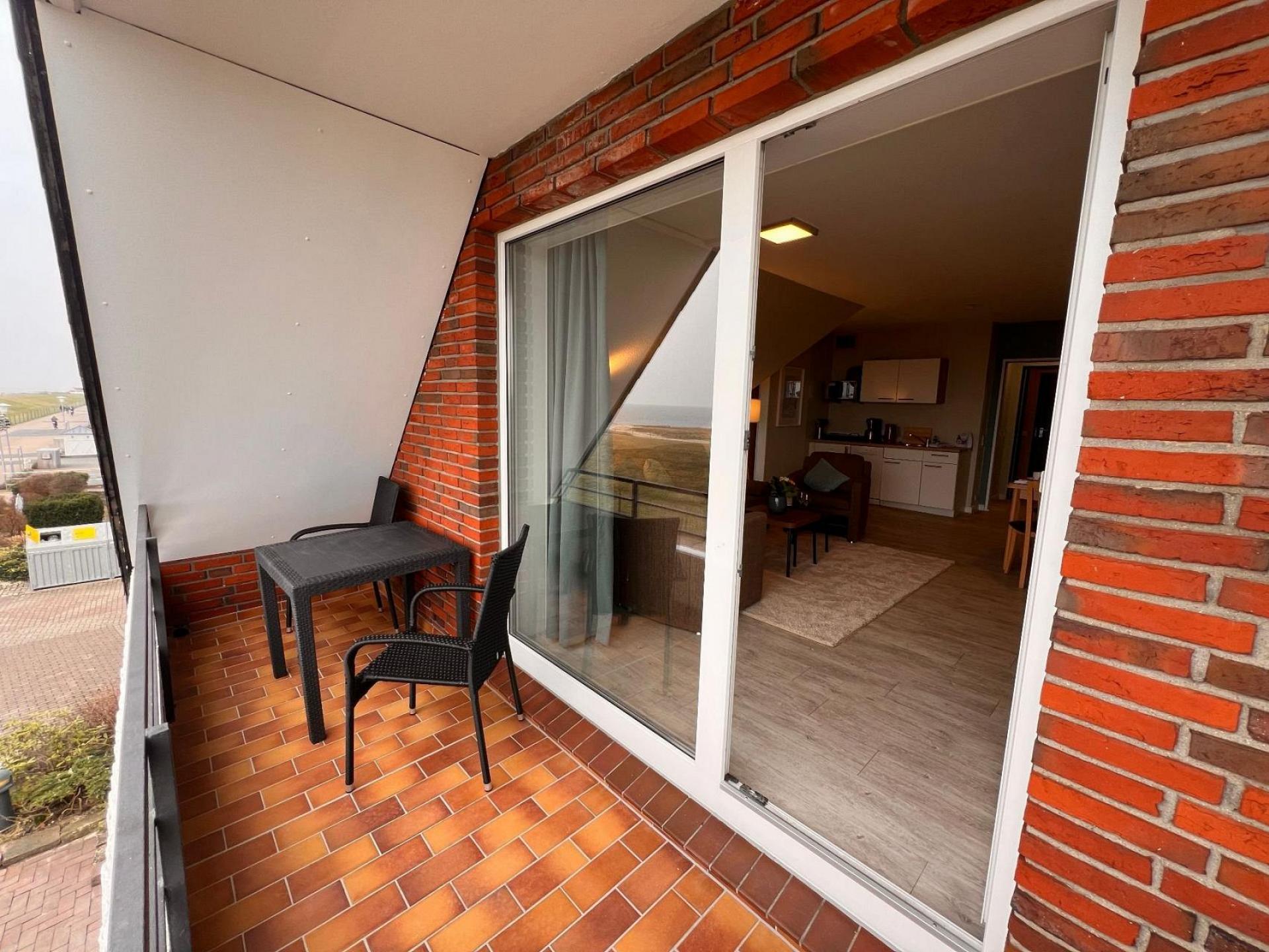 Ferienwohnung NW 34 Balkon mit Meerblick Foto 8
