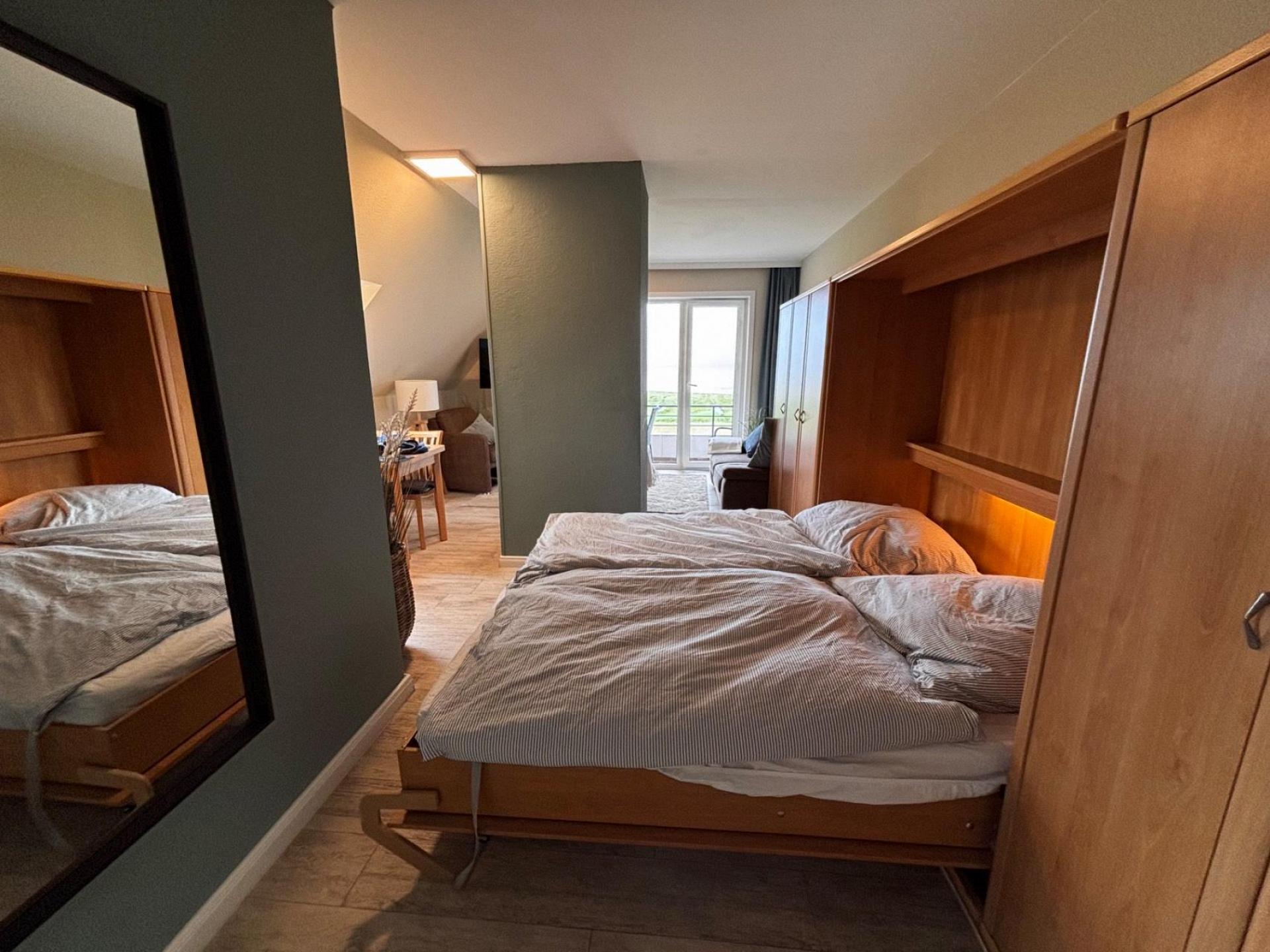 Ferienwohnung NW 43 Balkon mit Meerblick Foto 9