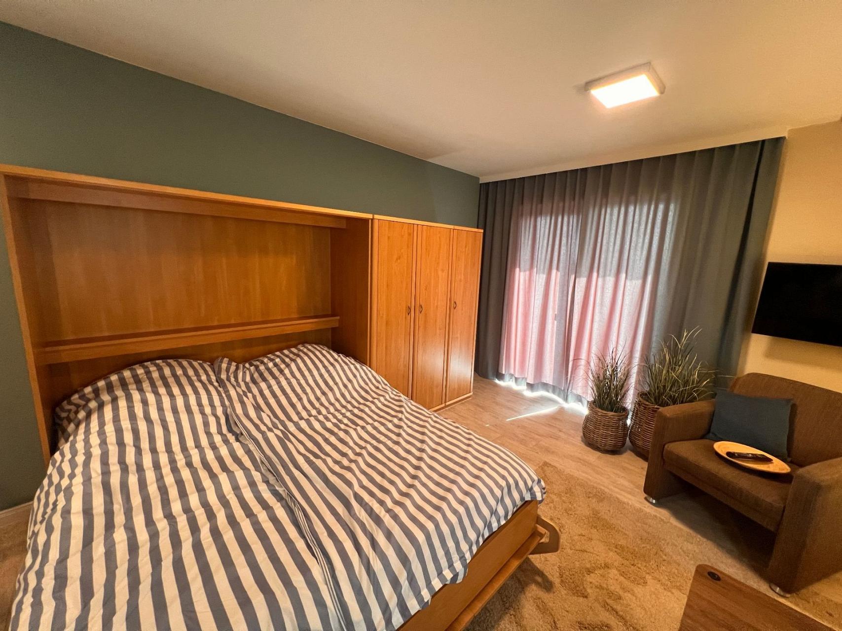 Ferienwohnung NW 44 mit Süd Balkon Foto 11